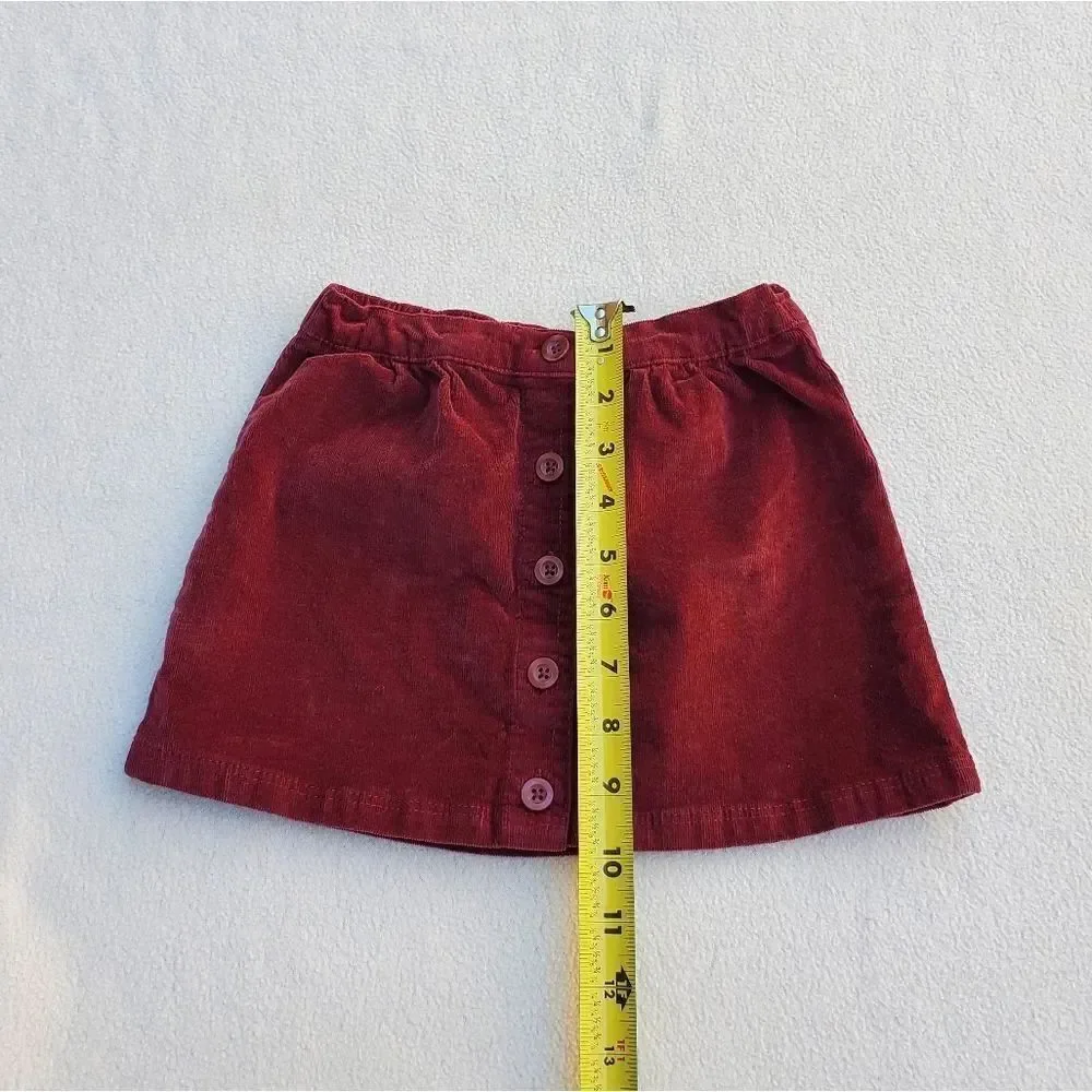 Girls 2 tops and skirt bundle Size 4-5